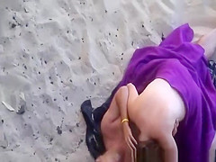 Couple spied having sex in the beach