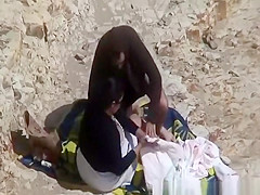 Couple caught fucking in the beach rocks