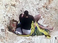 Couple caught fucking in the beach rocks