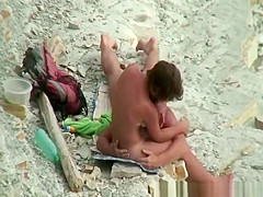 Nudist man gropes his woman's body