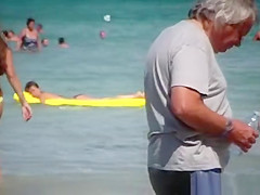 Sexy thick brunette in thong at beach