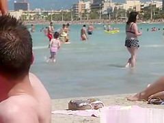 Sexy thick brunette in thong at beach