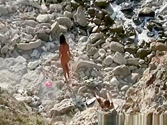 Skinny guy fucks girlfriend in rocky seashore