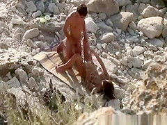 Skinny guy fucks girlfriend in rocky seashore