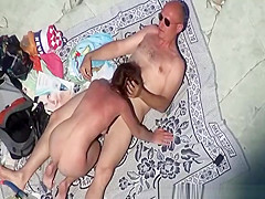 Mature sucks cock at nude beach