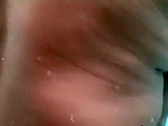 Mature woman spied while showering