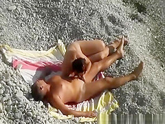 Interrupted nude beach handjob