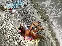 Interrupted nude beach handjob