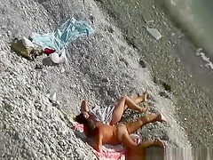 Interrupted nude beach handjob