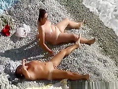 Interrupted nude beach handjob