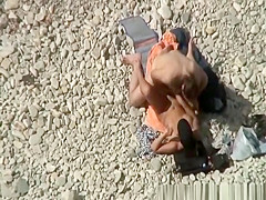 Couple caught fucking in the beach