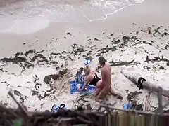 Couple spied fucking in the beach