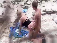 Couple spied fucking in the beach