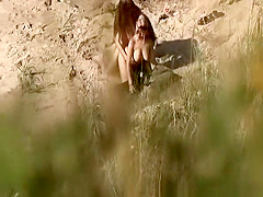 Nudist blowjob in the beach