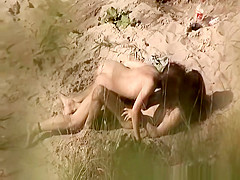 Nudist blowjob in the beach