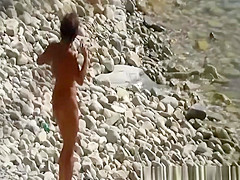 Mature couple fucking in beach