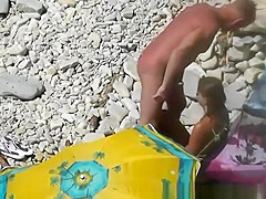 Nudist blows her standing man's penis