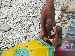 Nudist blows her standing man's penis