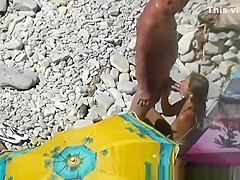 Nudist blows her standing man's penis