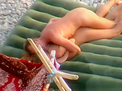 Skinny nudist couple fucking in beach