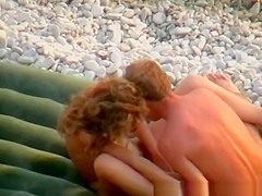 Skinny nudist couple fucking in beach