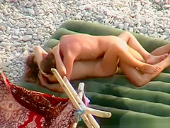 Skinny nudist couple fucking in beach