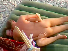 Skinny nudist couple fucking in beach