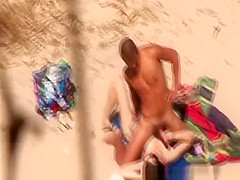 Mutual beach masturbation and cumshot