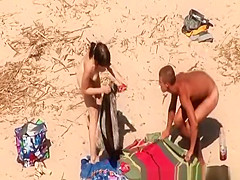 Mutual beach masturbation and cumshot