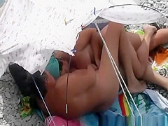 Mature woman fucked in the beach