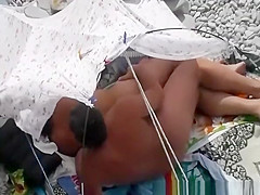 Mature woman fucked in the beach