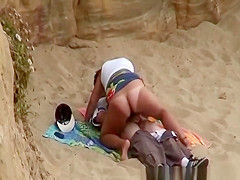 Chubby girl rides boyfriends cock in beach