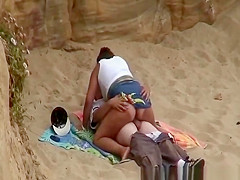 Chubby girl rides boyfriends cock in beach