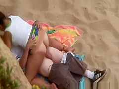 Chubby girl rides boyfriends cock in beach