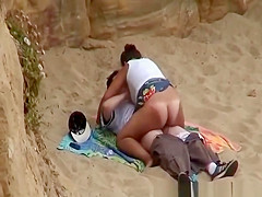Chubby girl rides boyfriends cock in beach
