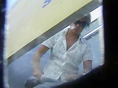 Woman changing at the beach