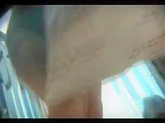 Woman changing at the beach