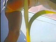 girl changing in beach cabin