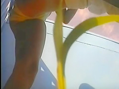 girl changing in beach cabin