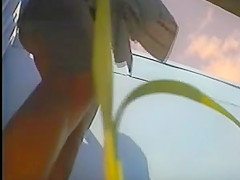 girl changing in beach cabin