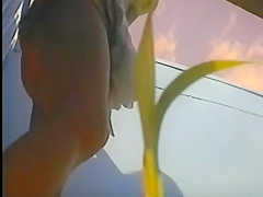 girl changing in beach cabin