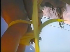 girl changing in beach cabin