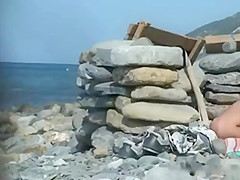 Couple Voyeured At Beach