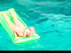 Hot blonde milf naked in ocean on public beach