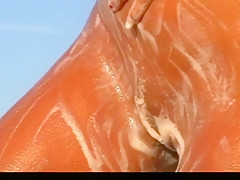 Hot blonde milf washing up again after a day on the beach 2