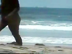 Nude couple at the beach
