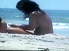 Nude couple at the beach