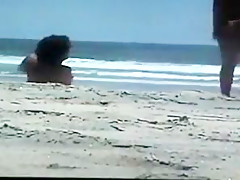 Nude couple at the beach