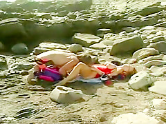 Chesty Lifeguard Doggy Fucked On Beach