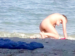 Hot Nudist Girls Tanning Naked In The Beach